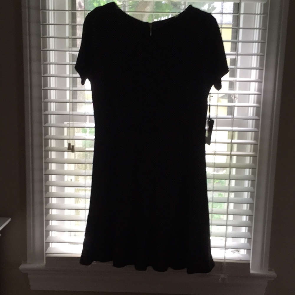 Ivory dot and black fit and flare dress